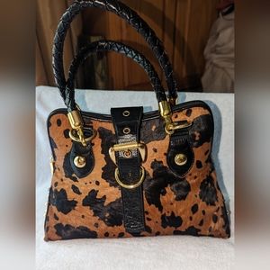 The Find calf hair with leather trim satchel bag.